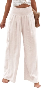 Close-up of smocked high waist and cotton linen texture on beige wide-leg pants
