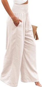 Detailed macro shot of high-waist pleated elastic waistband on beige wide-leg pants