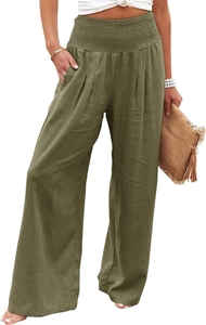 Detail of smocked elastic high waist and pocket on olive green wide leg trousers