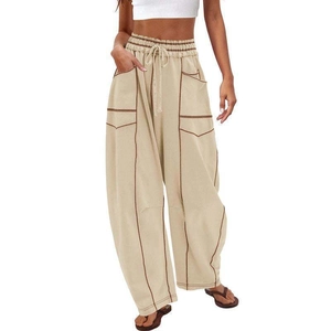 Women's khaki wide-leg cargo pants with drawstring waist and contrast stitching detail