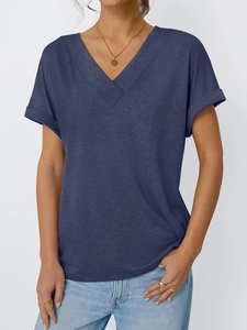 Detail shot of the V-neckline and rolled sleeve on a navy blue casual cotton t-shirt