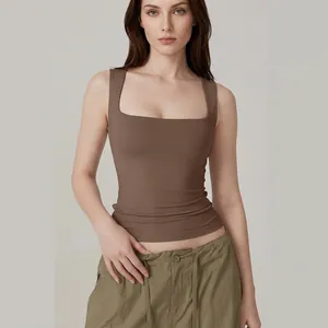 Slim fit brown square neck sleeveless tank top paired with olive cargo pants
