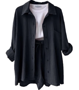 Detailed texture of black long sleeve shirt and drawstring shorts casual three-piece set