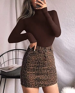 Detail of slim fit dark brown bodysuit paired with leopard print denim mini skirt