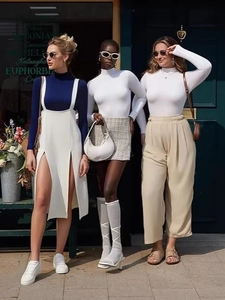 Chic women's slim-fit bodysuit and elegant streetwear outfit set with stylish accessories