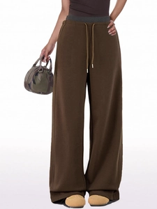 Detail of high-waist drawstring wide-leg sweatpants in deep coffee with grey elastic waistband