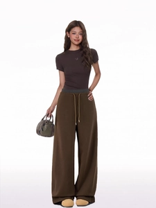 Detail view of brown casual set featuring a slim t-shirt and drawstring wide-leg pants