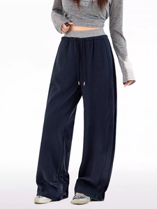 Detail view of navy blue wide-leg lounge pants featuring drawstring elastic high waist