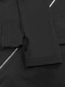 Detail view of black compression fabric with thumbholes and metal zipper closure