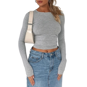 Slim fit grey long sleeve top paired with blue denim skirt for casual autumn fashion