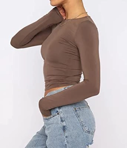 Side view of fitted dark brown long sleeve crop top with a clean crew neck design