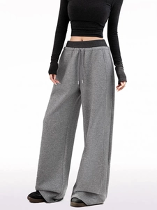 Women's grey wide-leg drawstring sweatpants with loose fit and high-waisted design