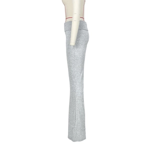Side view of light grey low-waist flared pants with fold-over waistband detail