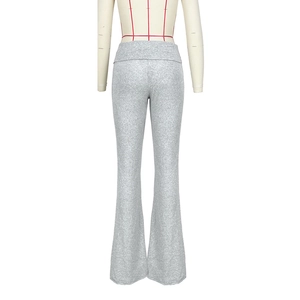 Back view of grey glitter flare yoga pants with high-waisted fold-over waistband design