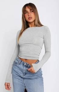 Detail of light grey slim fit long sleeve t-shirt with soft fabric texture and crew neck