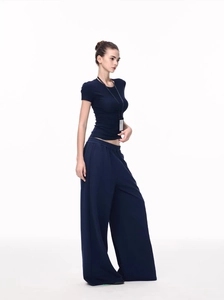 Detail of navy blue slim fit short sleeve t-shirt and high waist wide leg pants set