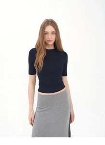 Close-up of tight-fitting navy blue short-sleeve T-shirt with a classic round neck design