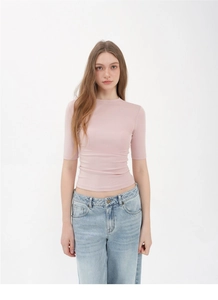Close-up of pink slim fit crew neck T-shirt in high elastic ribbed cotton fabric