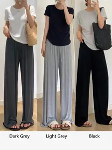 Pantalon large minimaliste à taille haute pour femme en gris et noir décontracté