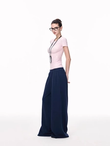 Slim fit pink short sleeve t-shirt with high waist wide leg navy pants for women
