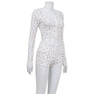 Women floral loungewear set with long sleeve crop top and matching shorts in white and pink