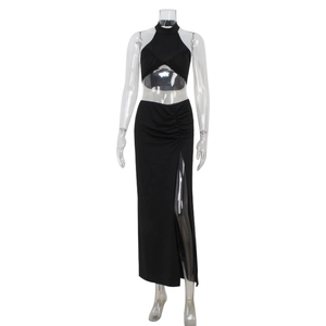 Completo due pezzi nero da donna con scollo all'americana e gonna lunga con spacco