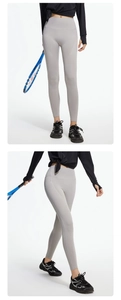 Detailed front and side view of high-waist light grey yoga pants for women's fitness