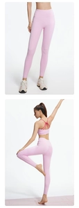 Detailed back view of pink criss-cross yoga set featuring high-waist butt lift leggings