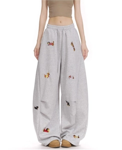 Detailed embroidery of cartoon dogs on gray wide-leg sweatpants with drawstring waist