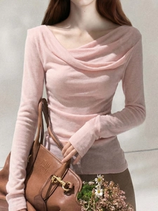 Slim fit light pink long sleeve knit top with an off-the-shoulder stacked collar design