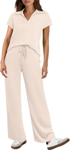 Detail of beige short sleeve polo top and matching drawstring wide leg trousers