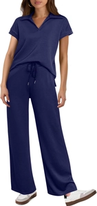 Detail view of navy blue V-neck short sleeve top and wide-leg trousers with drawstring waist