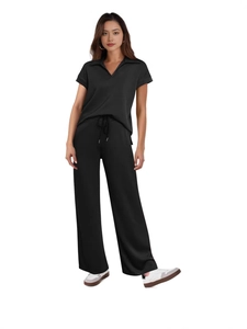 Women's casual black two-piece set featuring short sleeve polo top and wide-leg trousers