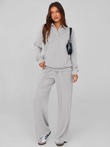 Detail of grey long sleeve polo top with high waist wide leg trousers lounge set
