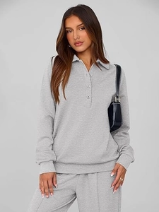 Detail of grey long sleeve Polo collar tracksuit set with soft knit fabric and buttons