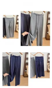 Dettagli dei pantaloni larghi grigi con coulisse in vita e trama delle tasche posteriori