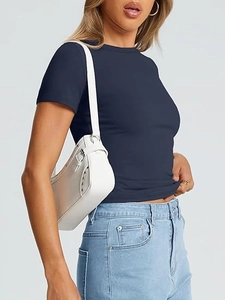 Slim fit navy blue short sleeve t-shirt with crew neck on model for a trendy summer look