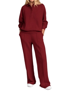 Detail of burgundy polo collar sweatshirt and wide-leg trousers set with pleat design