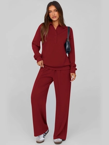 Detail of dark red two-piece lounge set featuring a long-sleeve polo shirt and wide-leg pants