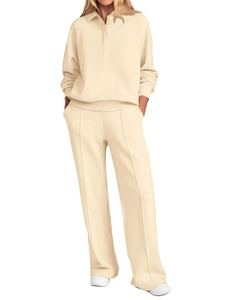Detail of cream long sleeve button-up sweatshirt and wide-leg trousers lounge set