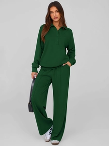 Detail of dark green long sleeve polo shirt and wide leg trousers set for women
