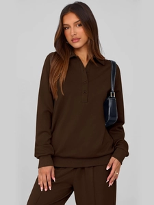 Detail of chocolate brown two-piece polo tracksuit set with ribbed cuffs and polo collar