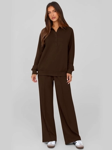 Detail of chocolate brown two-piece lounge set featuring polo neck top and pleated pants