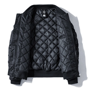 Men's black MA1 bomber jacket with diamond-quilted lining and ribbed elastic cuffs