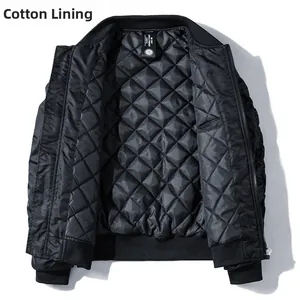 Detail of MA1 bomber jacket featuring black diamond quilted lining and ribbed collar