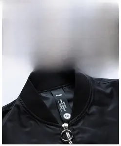 Detail of MA-1 flight jacket showing ribbed baseball collar and metal ring zipper pull