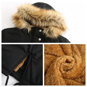 Close-up of black hooded parka with faux fur collar and thick warm fleece lining detail