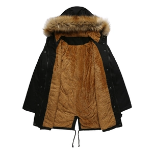 Detail of hooded black parka showing thick brown faux fur lining and plush collar