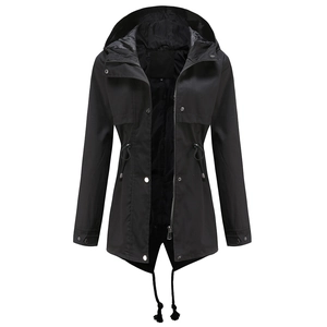 Detail of adjustable waist drawstring and metal snap buttons on black hooded raincoat