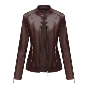 Detail of slim fit dark brown PU leather jacket featuring golden zippers and stand collar